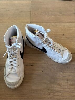 Nike White High-Top Sneakers with Black Swoosh Accents 10.5